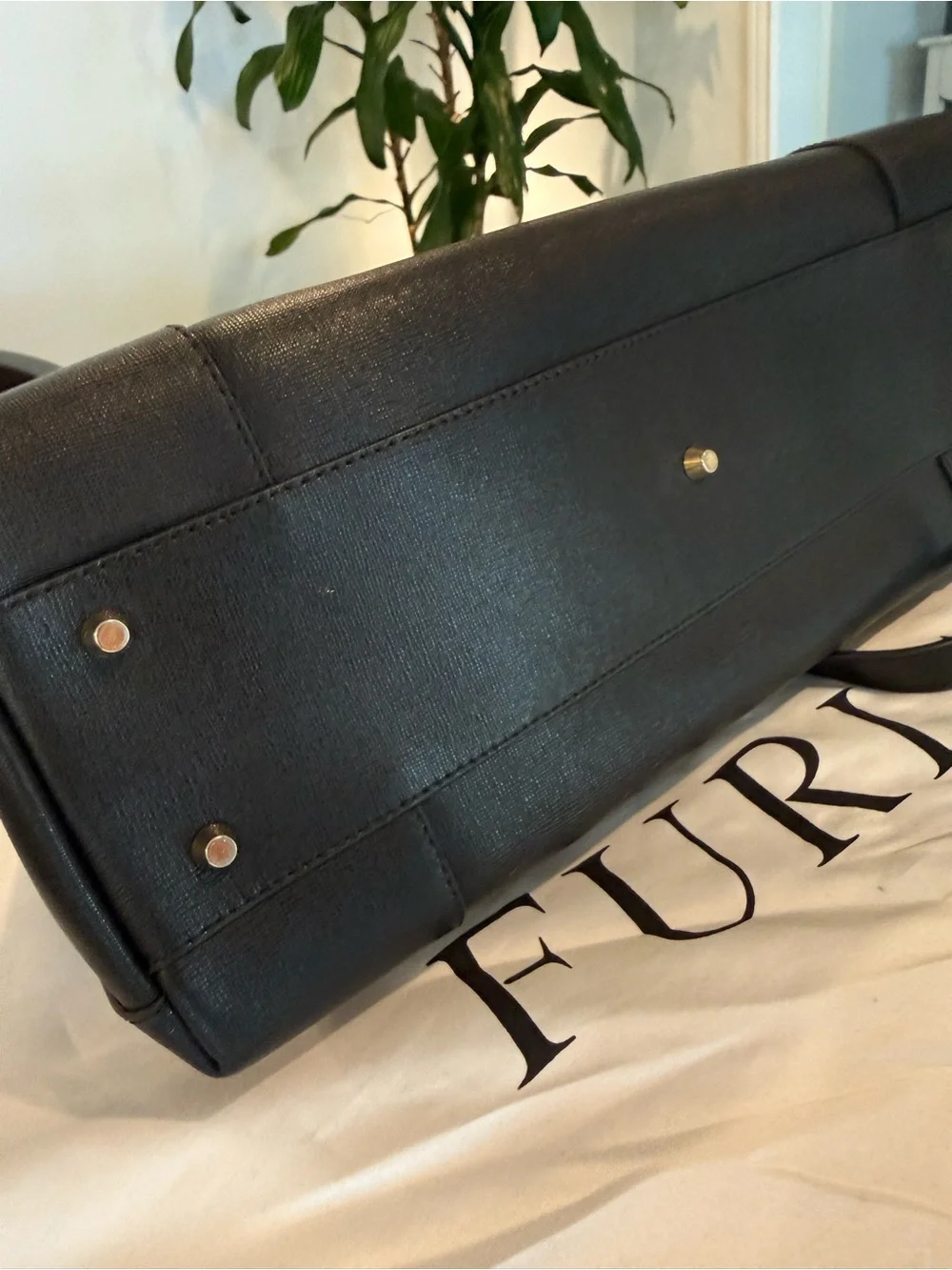 Furla downsizing figured